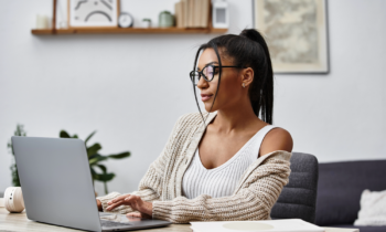 Young woman searching for work at home jobs with Google